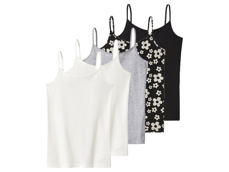 Ensemble de cinq débardeurs: deux blancs, un gris, un noir à fleurs et un noir uni.