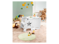 Petite table et chaise blanches pour enfant avec des jouets.