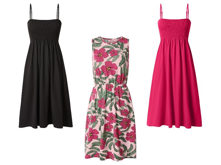 Trois robes d'été: noire, rose à fleurs et fuchsia.