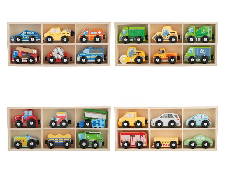 Véhicules jouets en bois, y compris les voitures d'urgence, de construction, agricoles et de tourisme dans des boîtes de rangement.