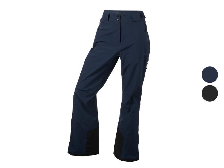 Pantalon de ski femme Crivit bleu foncé, avec des accents noirs et disponible en noir.