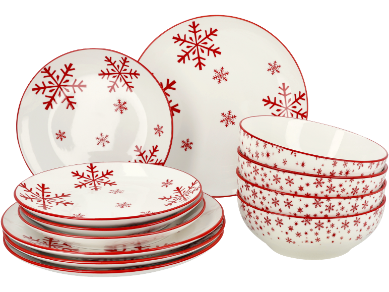 Service de table de Noël blanc et rouge avec motifs de flocons de neige.