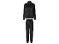 Survêtement en velours noir avec veste zippée et pantalon de jogging assorti.