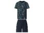 Ensemble pyjama homme bleu foncé avec t-shirt imprimé feuilles tropicales et short uni.