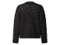 Pull en maille noir avec détails ajourés sur les épaules et le dos.