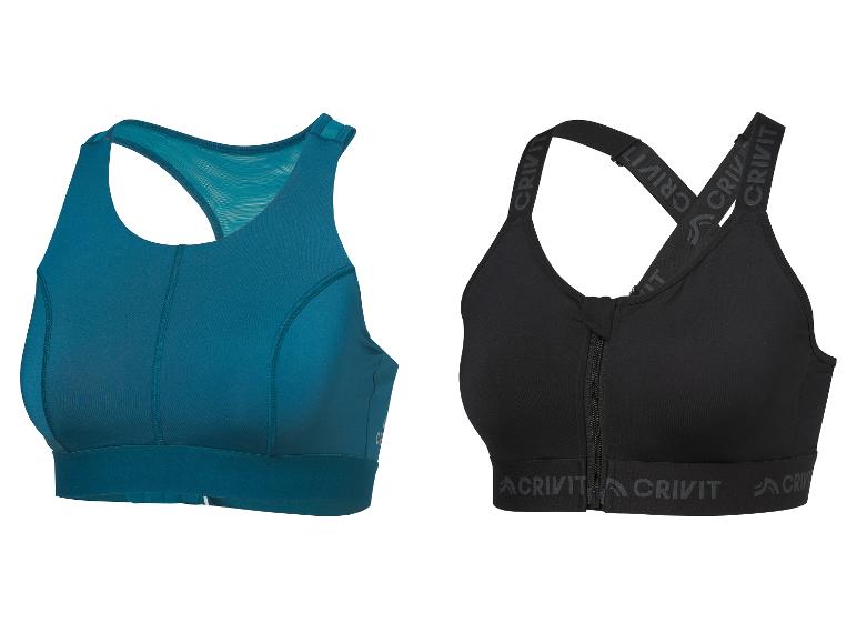 Deux soutiens-gorge de sport : un bleu sarcelle dos nageur et un noir avec fermeture éclair avant et bretelles Crivit.