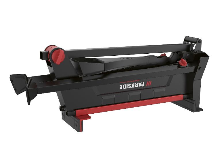 Un coupe-carreaux noir et rouge sur fond blanc.