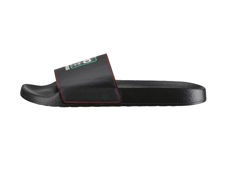 Claques noires pour hommes avec surpiqûres rouges et logo vert sur la sangle.