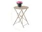 Table de bistrot pliante beige avec un pot de fleurs roses, dimensions 70,5x57cm.