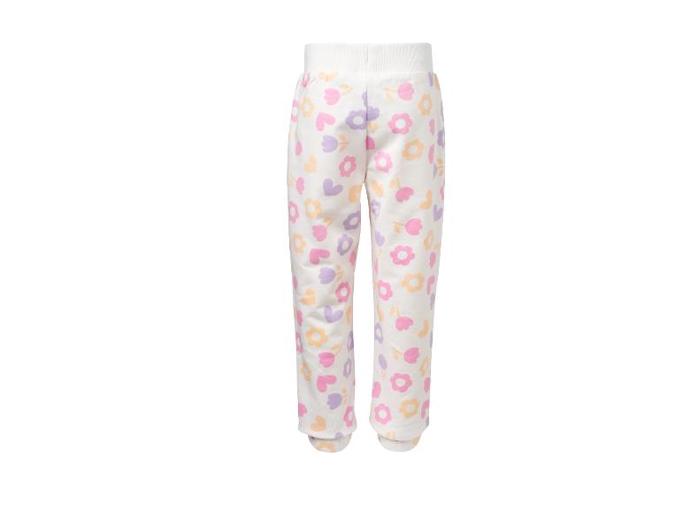 Pantalon de jogging blanc pour enfant avec motifs de fleurs et de cœurs colorés.
