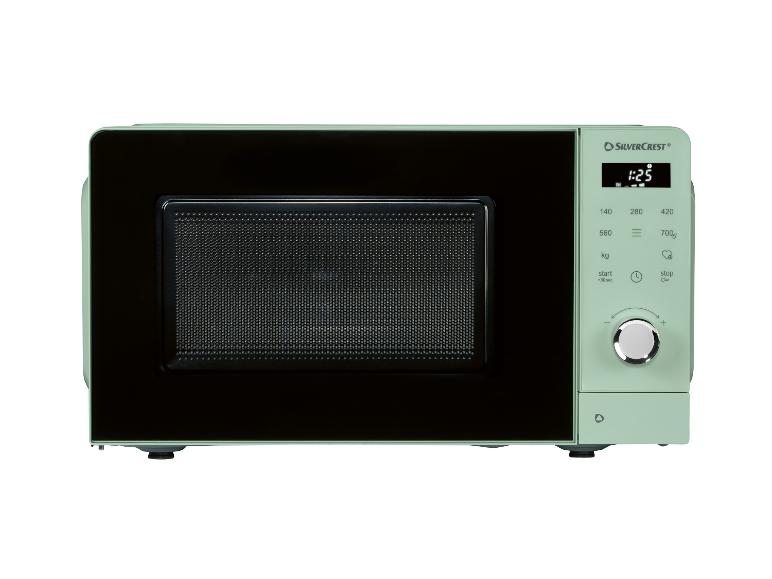Four à micro-ondes vert menthe avec affichage numérique 1:25 et panneau de commande