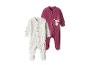 Deux pyjamas bébé, un à pois et un avec un lapin.
