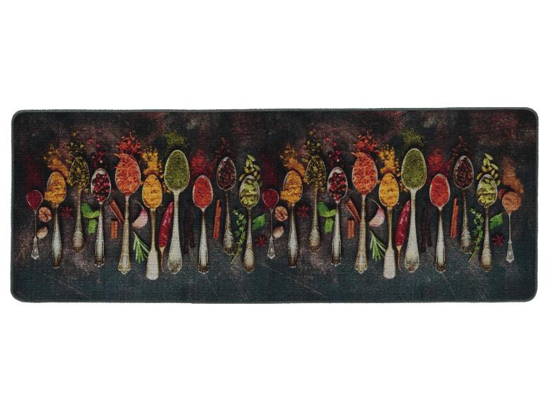 Un long paillasson de cuisine avec un motif d'épices dans des cuillères.