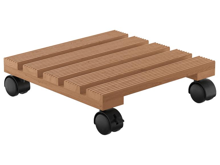 Table en bois avec roulettes pour plantes.