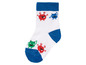 Chaussette blanche avec des accents bleus et un motif de monstres.