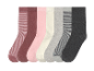 Six paires de chaussettes pour femmes dans des tons pastel et gris.