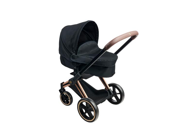 Poussette noire avec des détails rose gold.