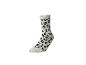 Chaussette blanche à motif léopard noir et marron.