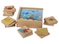 Jouets en bois avec des animaux marins, y compris des crabes, des poissons et une tortue.