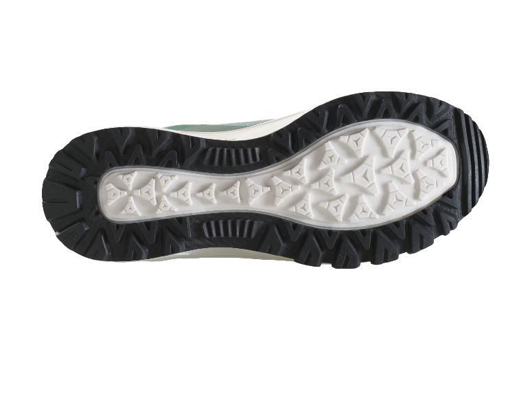 Semelle d'une chaussure de sport verte.