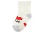 Chaussette bébé blanche avec cœurs rouges et texte noir 'I love M'.