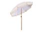 Parasol rayé beige et blanc avec franges.