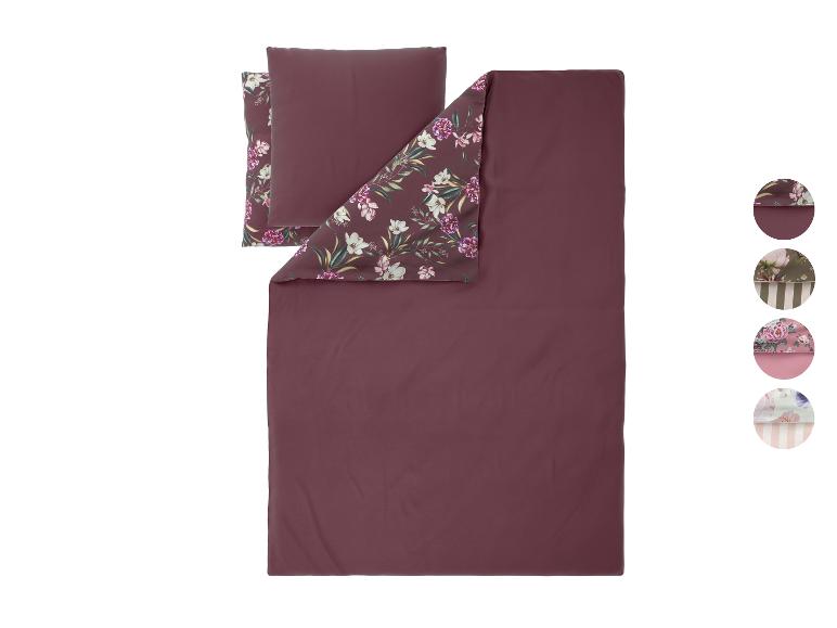 Parure de lit rouge foncé à motif floral, avec des échantillons d'autres motifs.