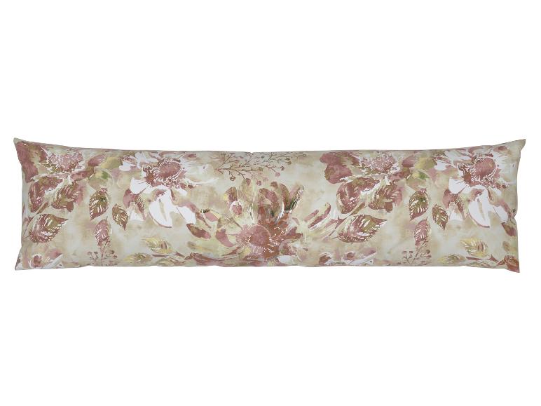 Long oreiller avec un motif floral dans les tons rose et beige.