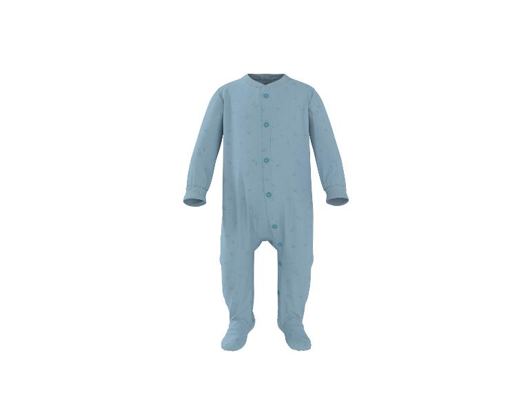 Grenouillère bébé bleue avec motif étoiles et boutons-pression.
