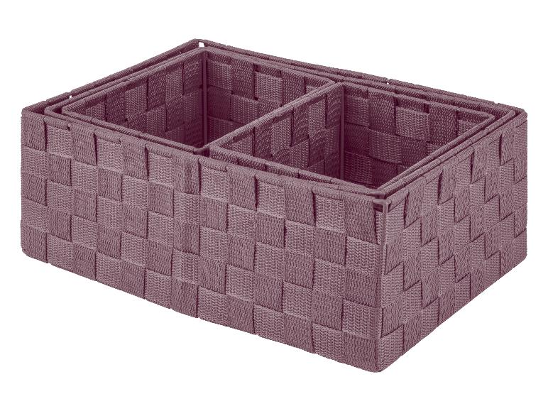 Trois paniers de rangement marrons à motifs tressés.