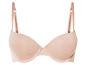 Un soutien-gorge beige avec des bonnets lisses et des bretelles réglables.