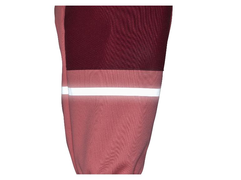 Pantalon rose et bordeaux avec une bande réfléchissante.