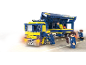 Jeu de construction d'un camion bleu et jaune avec des figurines.