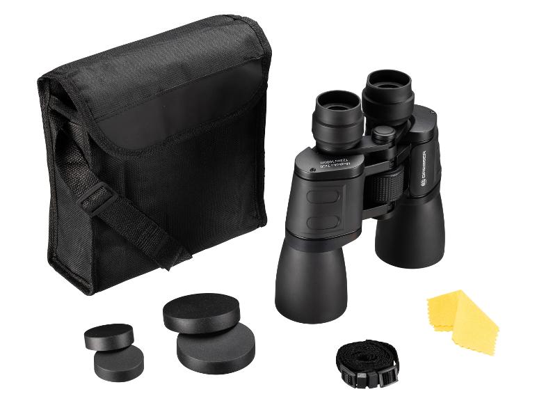 Jumelles noires avec étui de transport, capuchons d'objectif, sangle et chiffon de nettoyage.