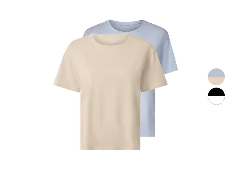 Deux t-shirts à manches courtes, un beige et un bleu clair