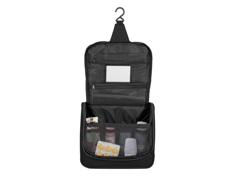 Une trousse de toilette ouverte avec un miroir et plusieurs compartiments.