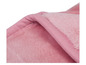 Une couverture en polaire rose avec une fourrure douce.