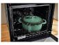 Cocotte en fonte verte Silvercrest dans le four.