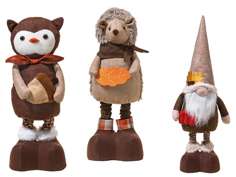 Décorations d'automne : une chouette, un hérisson et un gnome dans des tons marron et orange.