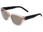Lunettes de soleil avec monture beige et branches noires.
