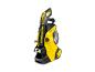 Nettoyeur haute pression jaune et noir avec tuyau et buse.