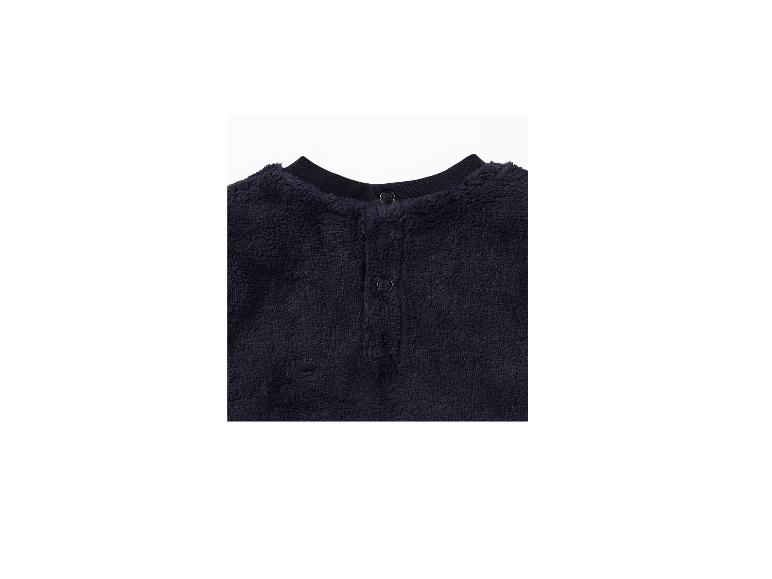 Pull douillet bleu marine avec col rond et boutons