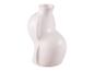 Un vase blanc organique.