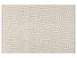 Tapis beige et blanc à motifs géométriques.