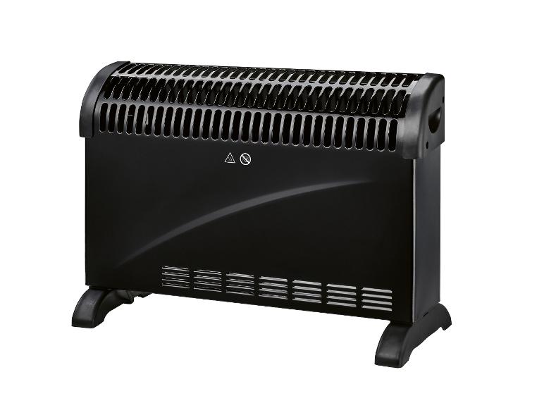 Radiateur électrique noir avec grilles de ventilation et symboles de sécurité.