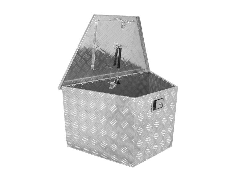 Boîte en métal ouverte avec motif losange.