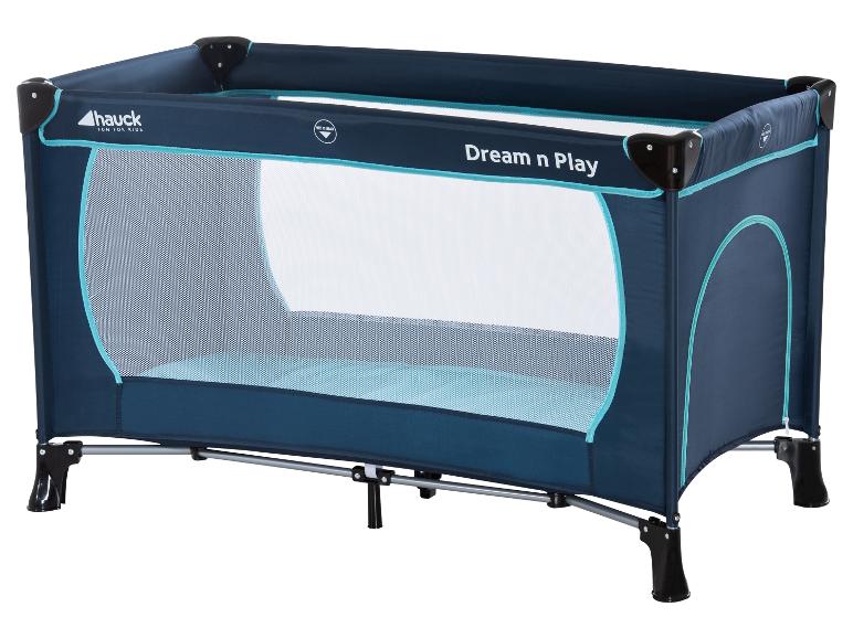 Lit de voyage bleu avec côtés en maille et texte 'Dream n Play'