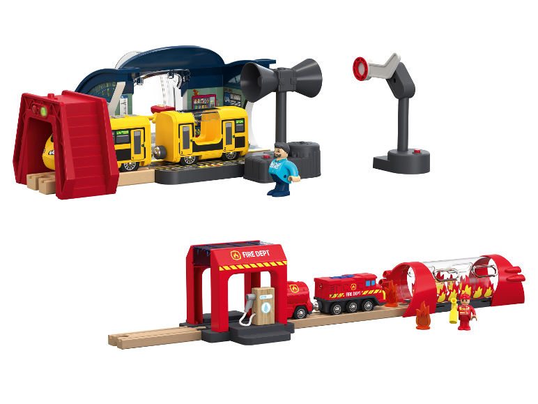 Ensemble de trains jouets avec une station de métro jaune et une caserne de pompiers rouge.
