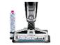 Nettoyeur de sols avec brosse multi-surfaces et une brosse de rechange.