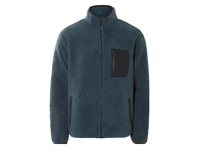 Une veste en polaire bleu foncé avec fermeture éclair
